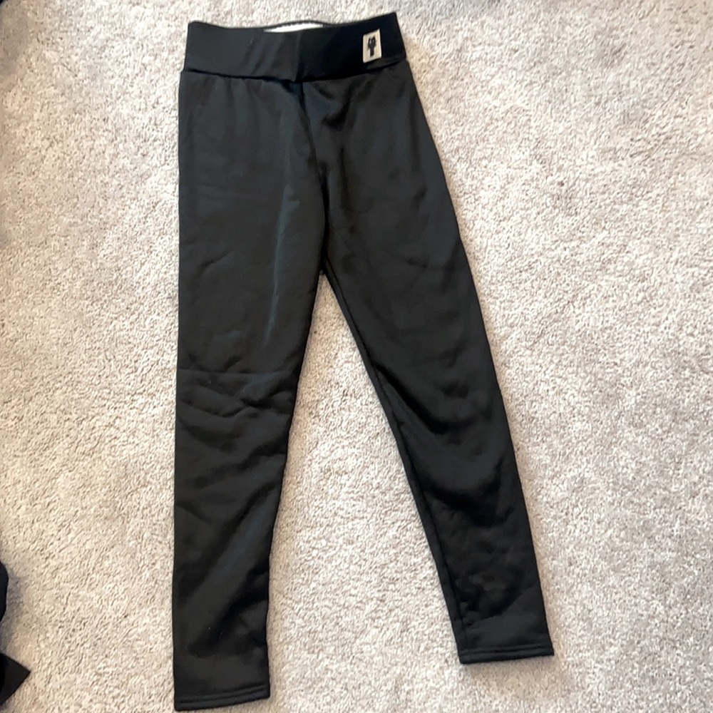 Fleece lined black leggings size medium, but fit as a small. Never been worn.